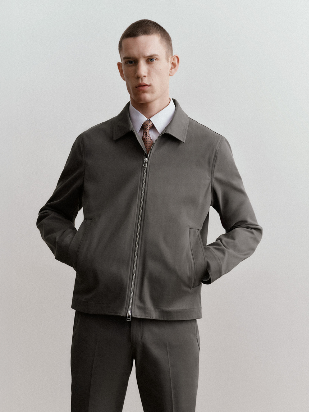 man in chinos and shirt jacket